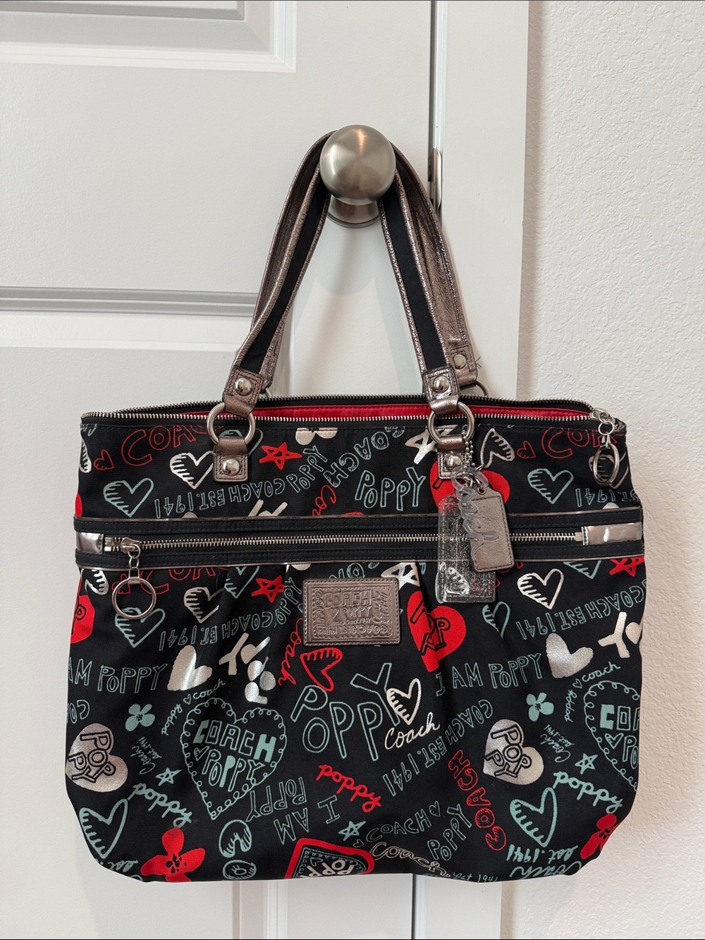 Coach Black Tote with Red, White, and Teal Graphic Print